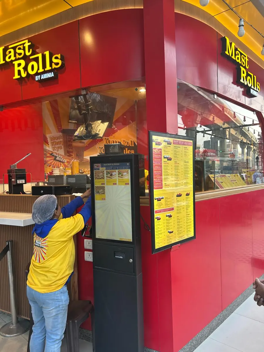 PALAS floor-standing self-ordering kiosk installed at a food counter
